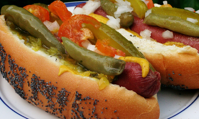 The maximalist Chicago-style hot dog, which is often referred to as "dragged through the garden" due to its many toppings. (photo by deciBelle/Flickr)