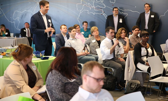 Bear Analytics CEO Joseph Colangelo (second from right) and VP of Business Development Eric Misic (left) look on as an audience member asks a question. (Handout photo)