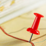 Pushpin on map. Travel and journey concept.