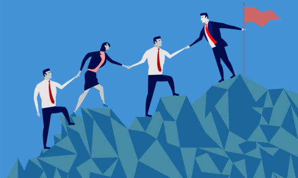 Business people climbing up a mountain