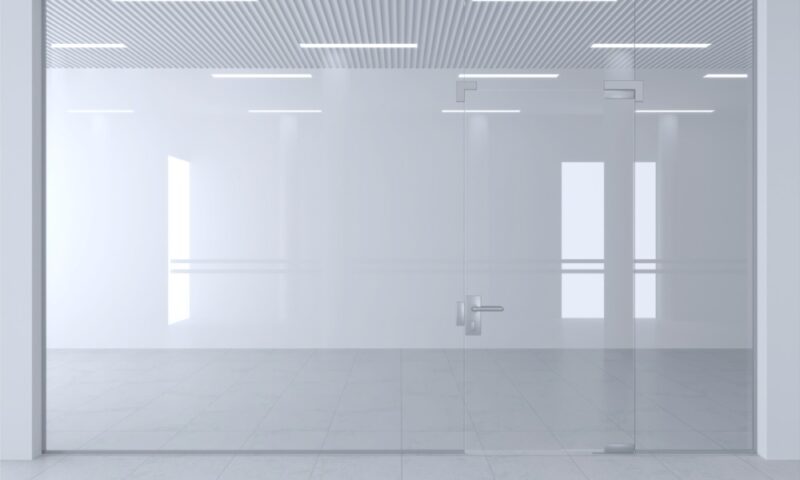 clear glass partition and doors in office space
