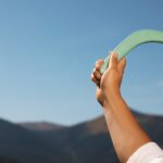 a man throwing a boomerang