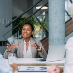 Shot of group of businesswomen in business meeting. Three female entrepreneurs on meeting in board room. Corporate business team on meeting in modern office. Female manager discussing new project with her colleagues. Company owner on a meeting with two of her employees in her office.