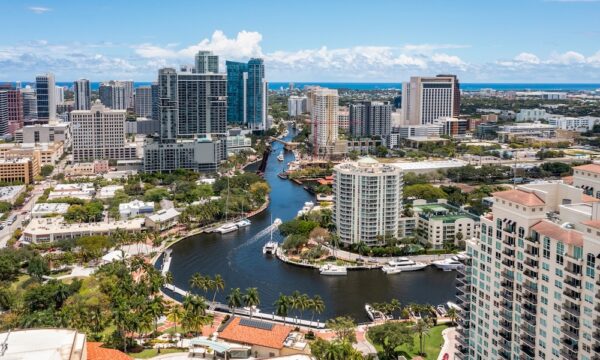Aerial drone view of Sailboat Bend neighborhood in Fort Lauderdale, view of the North fork new river, yachts, modern buildings, tropical vegetation