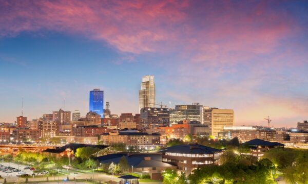 Omaha, Nebraska, USA downtown cityscape at dusk.