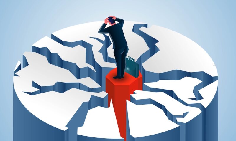 Isometric Businessman standing on top of mountain with multiple cracks, stock market falling, financial crisis or economic bubble burst, investment failure