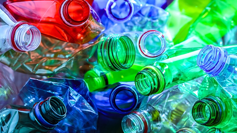 Empty colored drink bottles. Recyclable plastic waste.