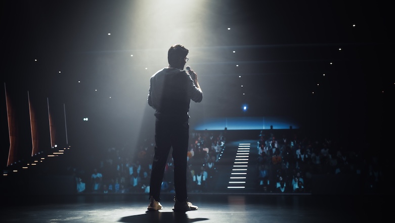 Public Speaker Sharing Professional Knowledge and Leadership Insights.